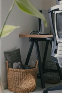 Best storage baskets for a home office desk, woven basket next to a computer